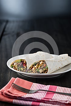Vegan wraps with lentil, chickpea peppers and kidney bean
