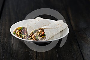 Vegan wraps with lentil, chickpea peppers and kidney bean