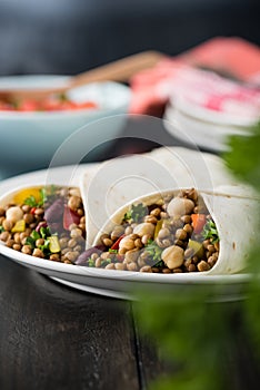 Vegan wraps with lentil, chickpea peppers and kidney bean