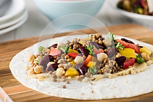 Vegan wraps with lentil, chickpea peppers and kidney bean