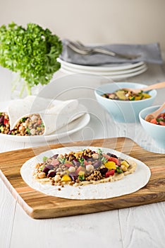 Vegan wraps with lentil, chickpea peppers and kidney bean