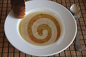 Veges and oinion soup with ciabatta bread for lunch in capital