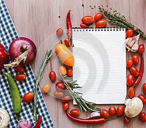 Vegetable background with a recipe book copy space