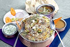 Vegetable biryani, eggplant curry,tandoori roti,