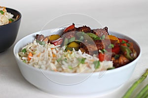 Vegetable Carrot Fried Rice with Indian spices served along with chilly chicken