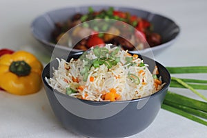 Vegetable Carrot Fried Rice with Indian spices served along with chilly chicken