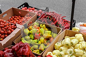 A vegetable counter at a street market. Trade in seasonal goods. pepper