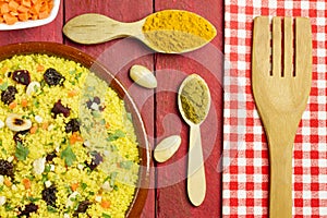 Vegetable couscous in a clay pot