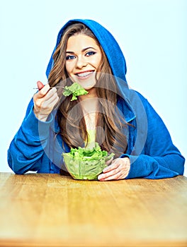 Vegetable diet concept. woman eating salad