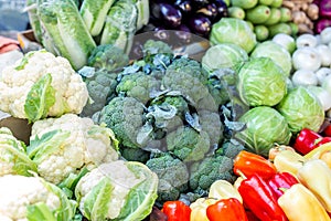 Vegetable farmer market counter. Colorful heap of various fresh organic healthy vegetables at grocery store. Healthy natural food