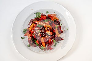 Vegetable french fries from sweet potato, pumpkin, beetroot, sesame seeds and green parsley