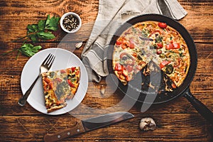 Vegetable frittata with broccoli and red bell pepper