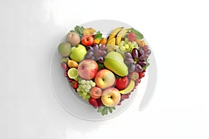 Vegetable and fruit heart. White isolated background. Heart as a symbol of affection and