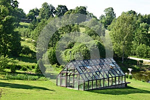 Vegetable gardening in a greenhouse.