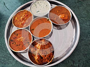 Vegetable Gujarati kathiyawadi thali on table, Indian thali meal