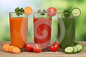 Vegetable juice from carrots, tomatoes and cucumber