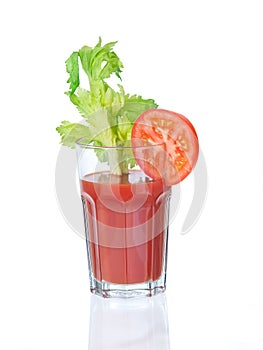 Vegetable juice glass with garnishings photo