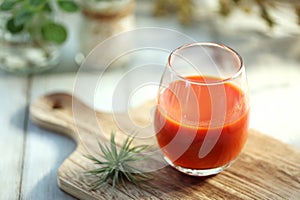 Vegetable juice poured into a glass