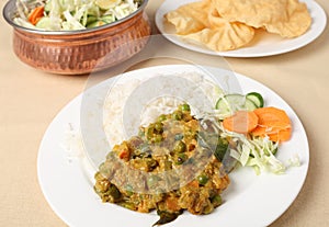 Vegetable korma and salad