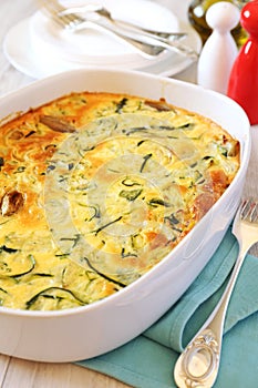 Vegetable marrow squash casserole with cheese and shallot