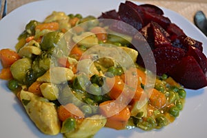 Vegetable and meat stew with beetroot salad