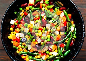 Vegetable mix in authentic pan on wooden background. Mexican food concept. Budget-friendly menu