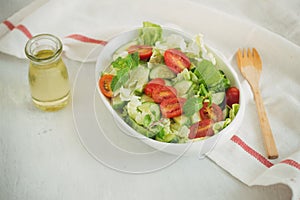 Vegetable mix salad in a bowl on kitchen table