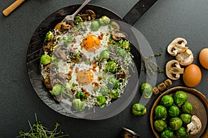 Vegetable omelet with bulls eye egg and sprouts