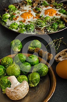 Vegetable omelet with bulls eye egg and sprouts