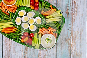 Vegetable platter with hot mayo dipping close up