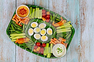 Vegetable platter with hot mayo dipping and ranch close up