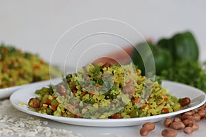 Vegetable Poha is a quick breakfast or snack made of beaten rice or flattened rice along peanuts, carrots and chilies