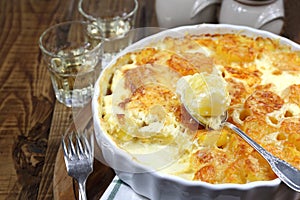 Vegetable potato gratin with cheese and cream