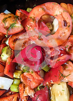 Vegetable salad in a black bowl