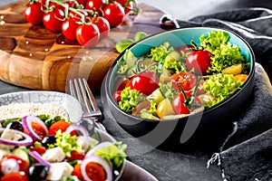 Vegetable salad bowl on kitchen table. Balanced diet
