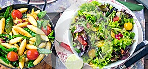 Vegetable salad bowl on kitchen table. Balanced diet.