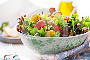 Vegetable salad bowl on kitchen table. Balanced diet.