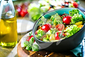 Vegetable salad bowl on kitchen table. Balanced diet