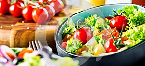 Vegetable salad bowl on kitchen table. Balanced diet