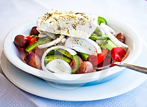 Vegetable salad with cheese photo