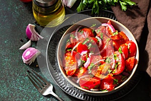 Vegetable salad with fresh tomato, onion and olive oil. Healthy food. Copy space