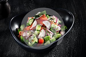 vegetable salad on grey background
