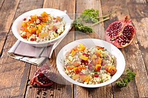 Vegetable salad with grilled pumpkin and pomegranate