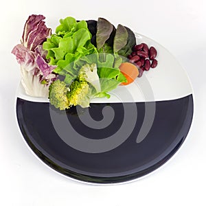 Vegetable salad on plate with blank spcae for wording photo