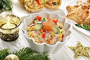 Vegetable salad with potato, carrot, corn and mayonnaise for Christmas