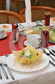 Vegetable salad served on edible plate