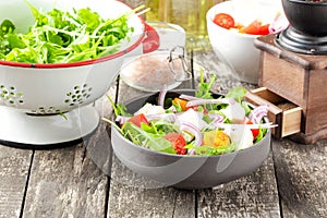 Vegetable salad on wooden table. Close up