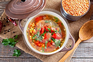 Vegetable soup with lentils on a table. Healthy food, healthy food. Top view