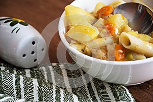 Vegetable soup with potato, carrot, quinoa, pea and pasta