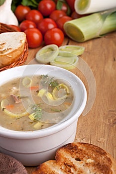 Vegetable soup on wooden table